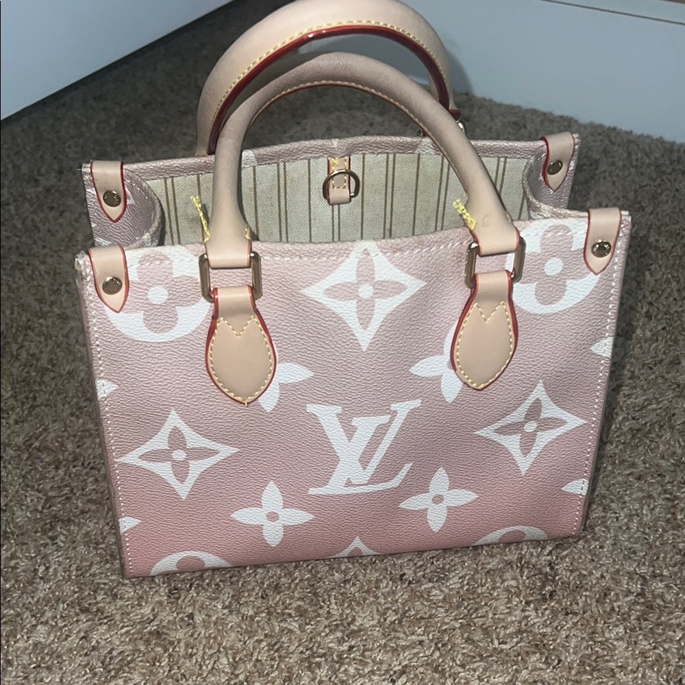 Louis Vuitton Pink Satchel with Monogram Design
